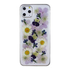 Clear iPhone case with preserved purple hydrangea-style blooms, daisies, and small greenery