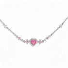 Silver chain bracelet with pink heart center and sparkly pink rhinestone accents