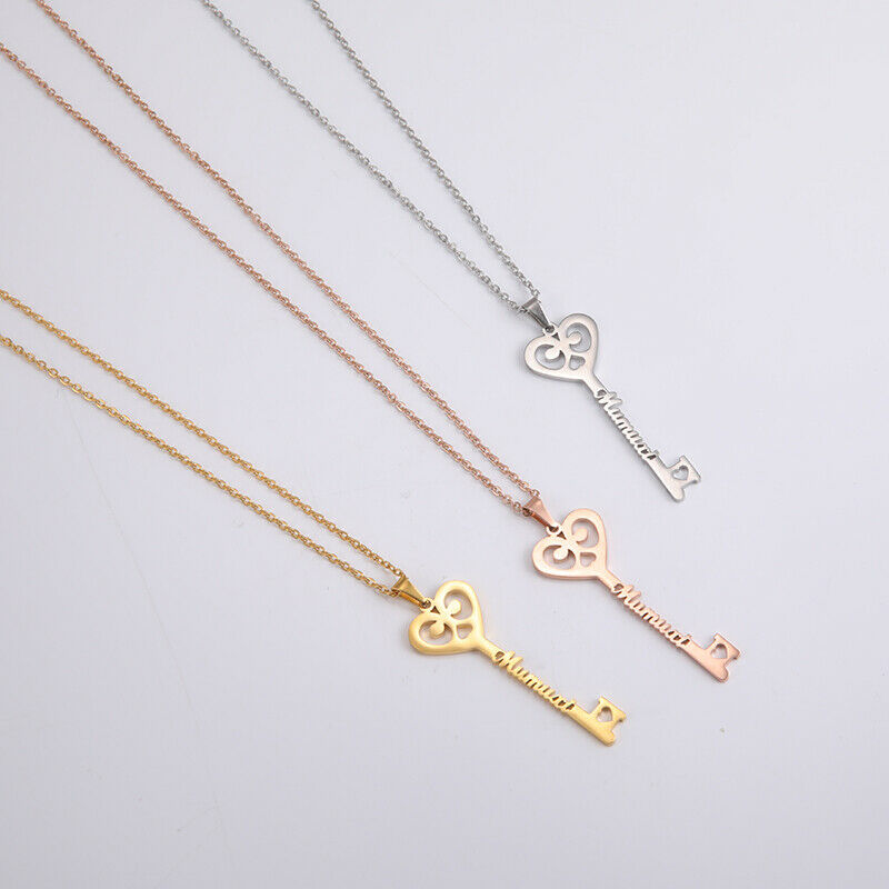 Gold, rose gold, and silver key pendant necklaces with heart-shaped key charms