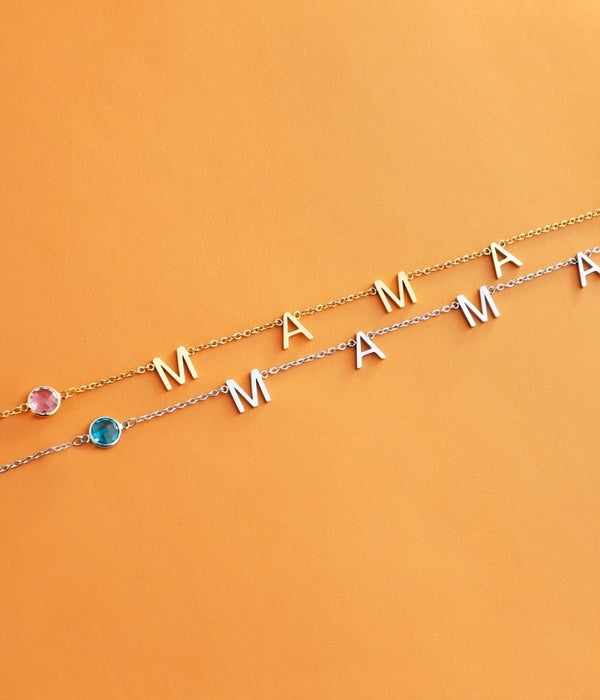 Gold initial necklace with letter charms M A and blue/purple bead stones