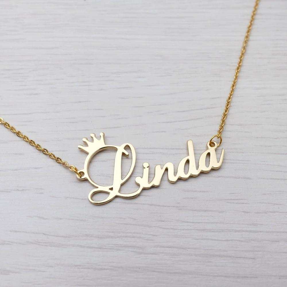 Gold engraved initial necklace with crown pendant, letter Linda and clasp chain