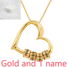 Gold heart name pendant necklace with engraved bead segments on a chain