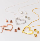 Set of heart name necklaces in mixed metals with engraved bead charms and chains