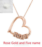 Rose gold heart name pendant necklace with engraved bead segments and chain