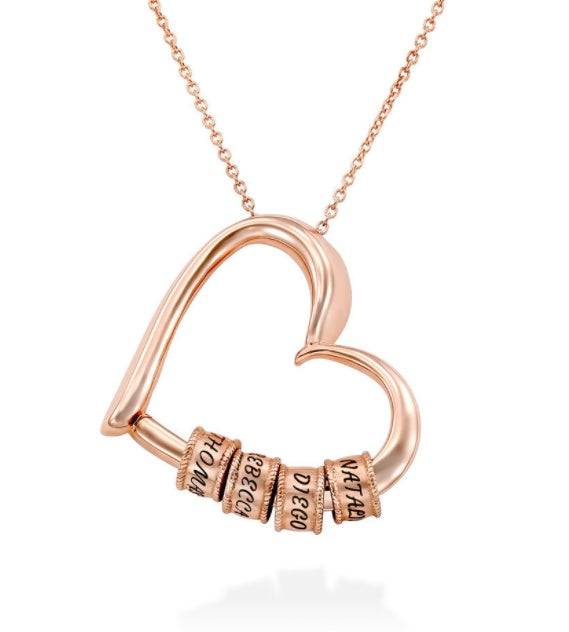 Rose gold heart name pendant necklace with stacked engraved beads on a chain