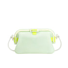 Waterproof silicone pouch in light mint green with flip-top clasp and white crossbody strap