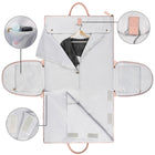 Foldable white duffle organizer bag with multiple compartments and a hanging hook panel