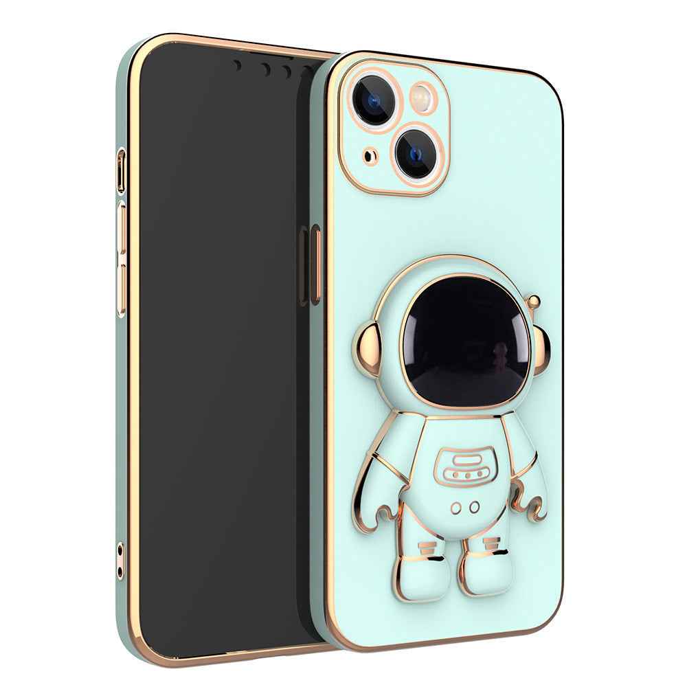 Light cyan phone case with 3D astronaut charm, ring grip, and dual camera cutouts