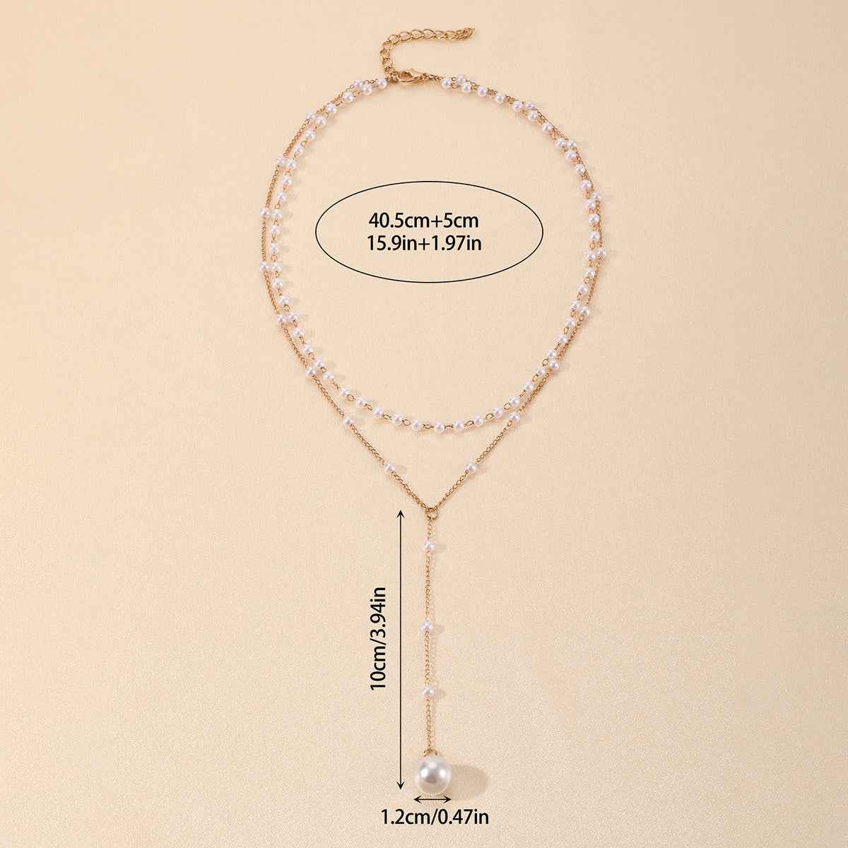 Double-layer pearl necklace with gold-tone chain, rhinestone-like band, and dangling pearl