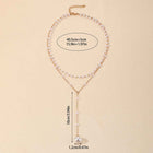Double-layer pearl necklace with gold-tone chain, rhinestone-like band, and dangling pearl