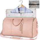 Foldable pink duffle bag with zip opening, front pocket, and quilted interior compartments